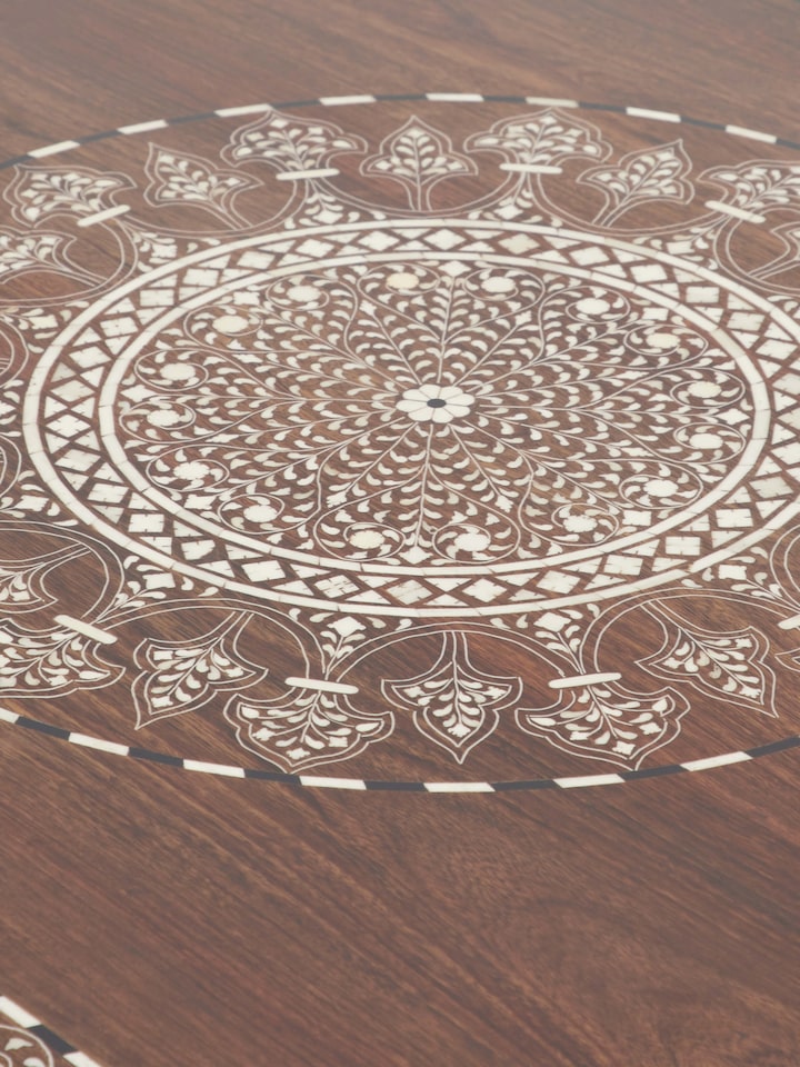 Angle view of Sheesham Wood Bone Inlaid 6-Seater Dining Table, showcasing the elegant inlay work and robust design