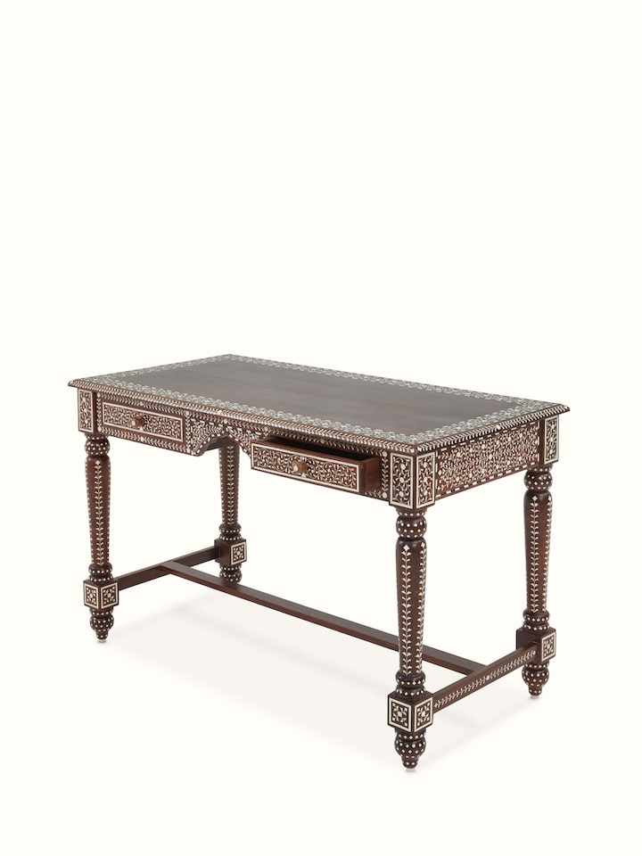 Angled top view of Swadesh Bone Inlay Sheesham Wood Study Table showing its spacious drawers and decorative details