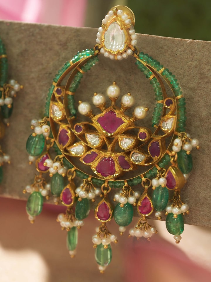 Close-up view of Jadau 18 Karat Gold Chandbalis showcasing the fine craftsmanship and gemstone details.