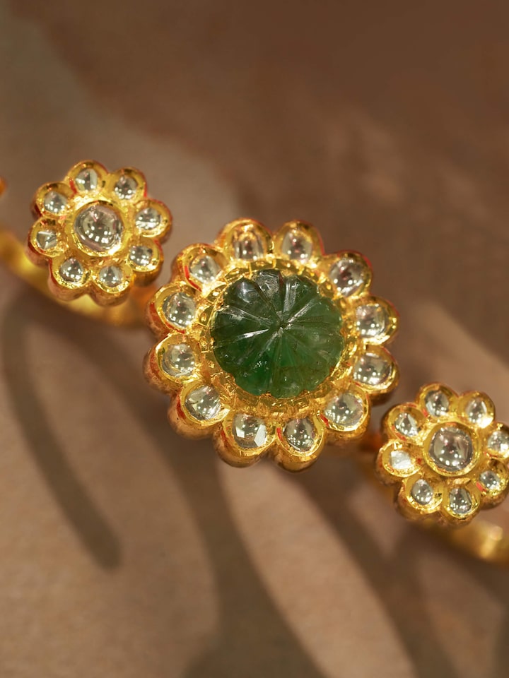 Detailed view of Jadau 18 Karat Gold 3-Finger Ring emphasizing the elegant Jadau work and gold detailing