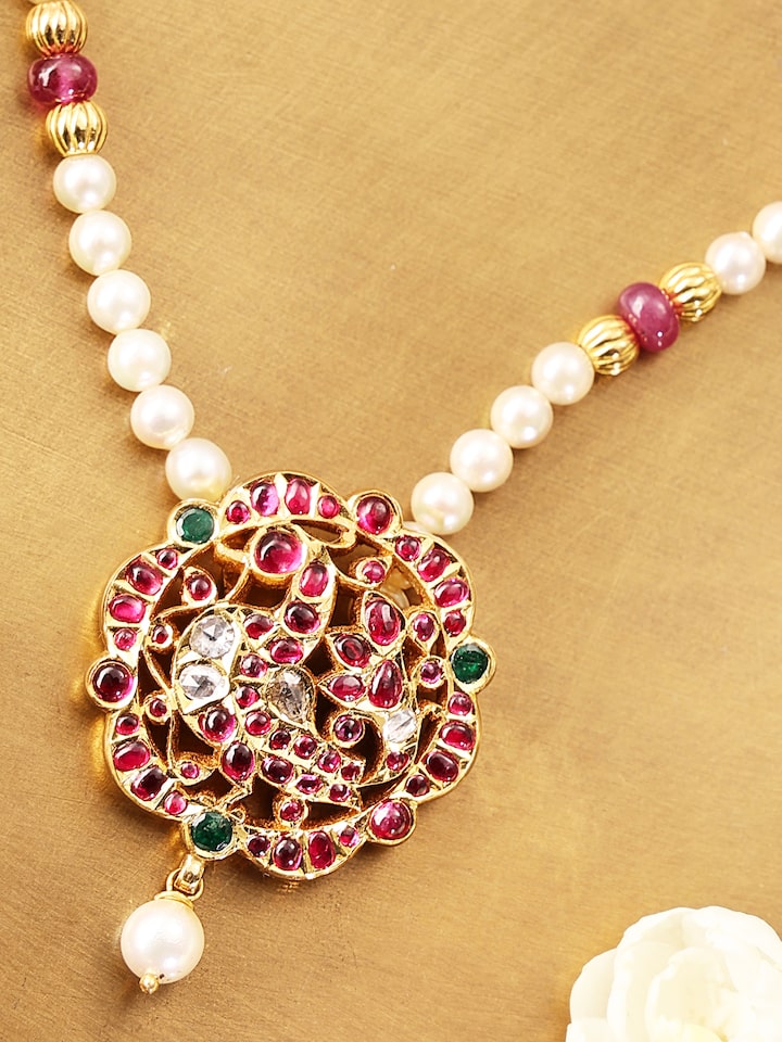 Detailed view of Kundala Velai 22 Karat Gold Collar Necklace showcasing the richness of gold and intricate design elements.