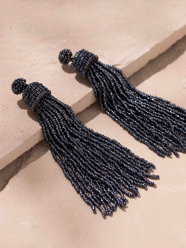 Detailed view of Handcrafted Drop Earrings from a distance to show their full design.