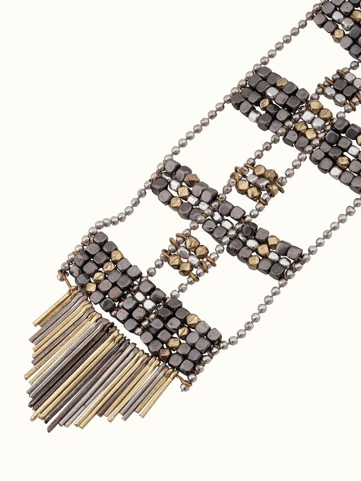 Angled view of Handcrafted long necklace focusing on intricate design and high-quality materials