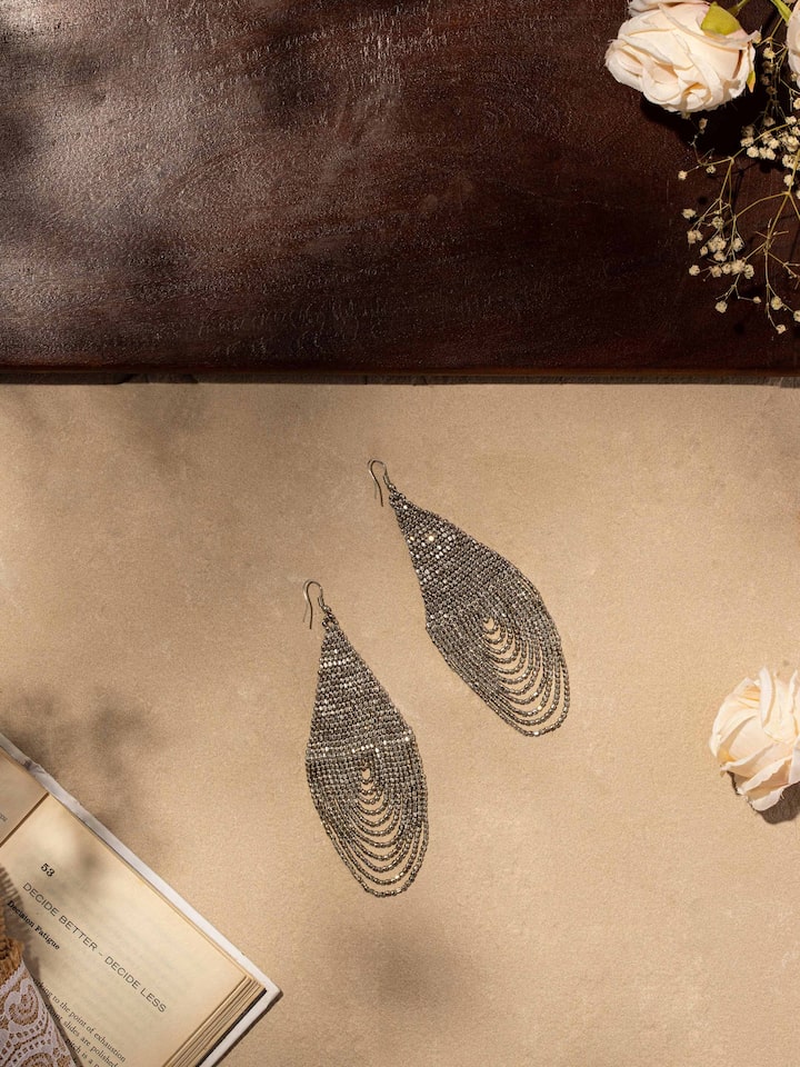 Side view of Handcrafted Drop Earrings highlighting the artisanal quality and detailed work.