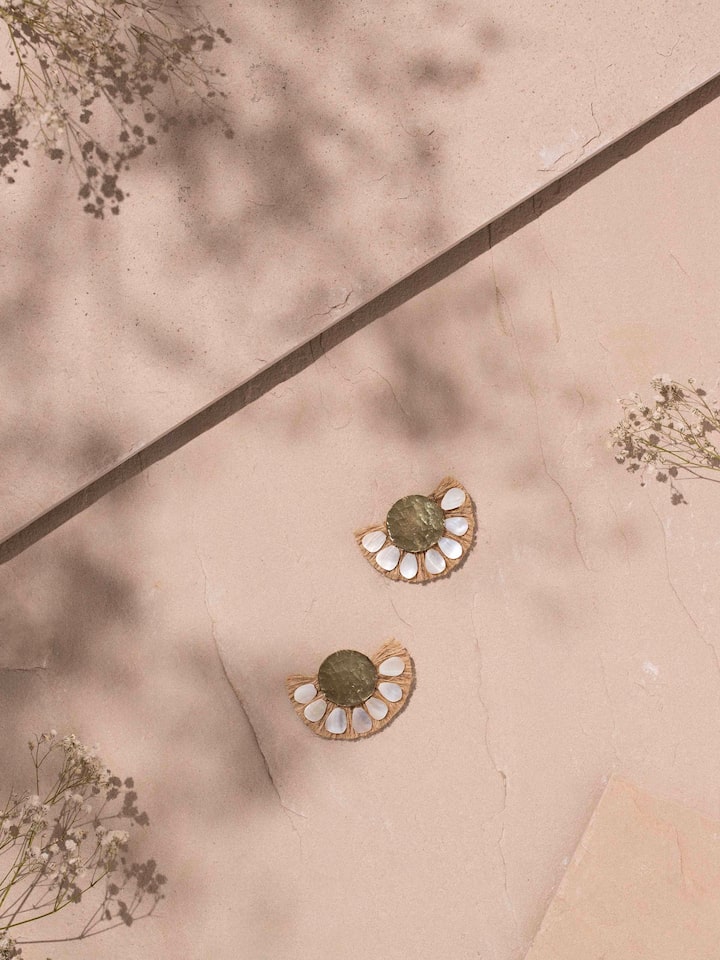 Side view of Handcrafted Drop Earrings displaying elegant design and craftsmanship.