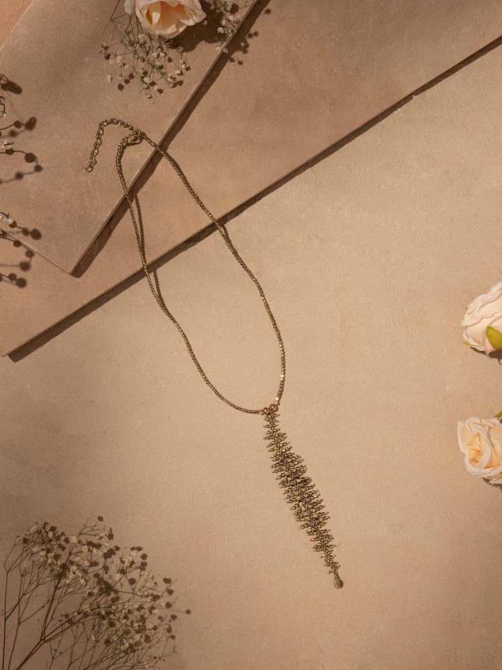 Styled detail view of Handcrafted Long Necklace worn around the neck, shown in an alternate styled shot
