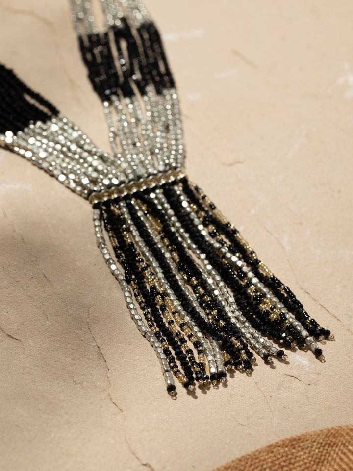 Detailed view of Handcrafted long necklace highlighting intricate patterns and artisanal quality