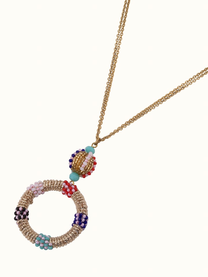 Angled view of handcrafted long necklace showcasing its elegant drape and intricate details