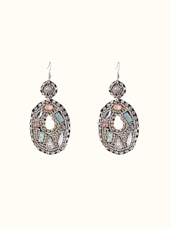 Front view of handcrafted drop earrings highlighting their unique design and craftsmanship