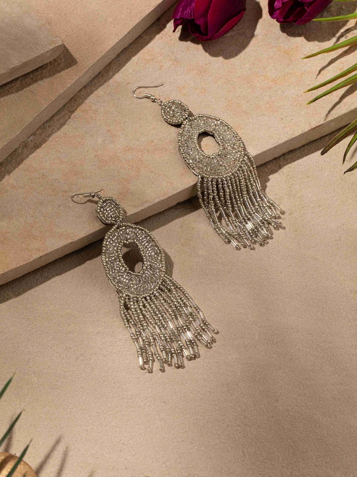 Side view of Handcrafted Drop Earrings showcasing the elegant drop design.