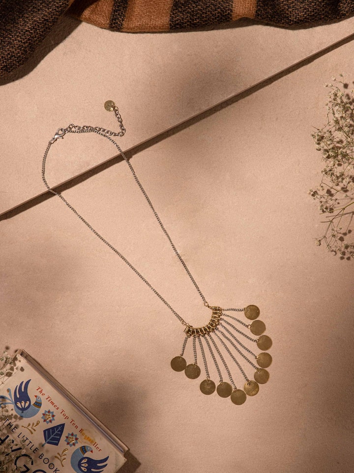 Close-up view of handcrafted long necklace highlighting its detailed beadwork