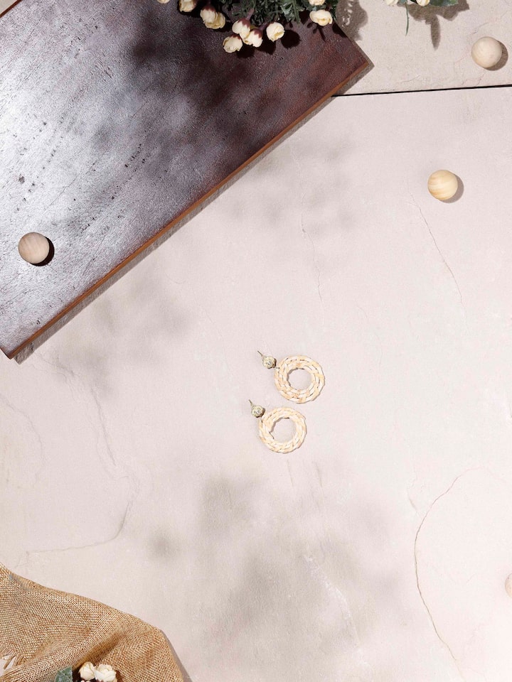 Close-up of Handcrafted stud earrings emphasizing design details