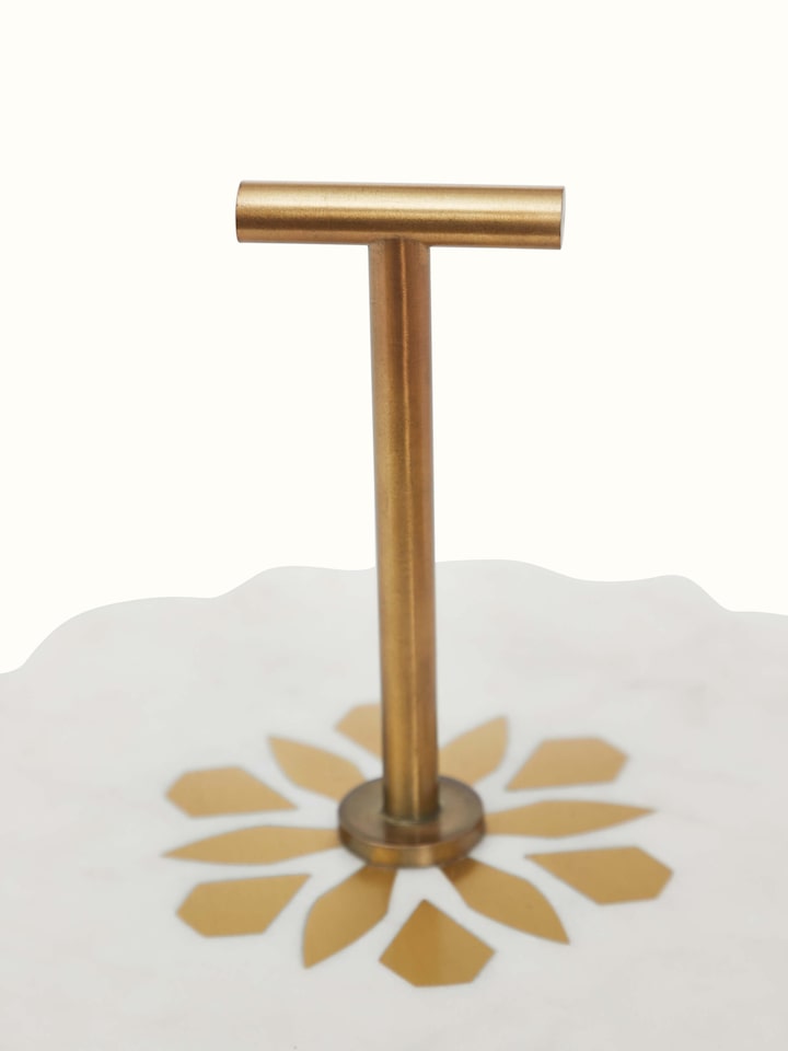 Close-up of Marble & Brass 2-tier cake stand showing the detailed craftsmanship of the marble and brass