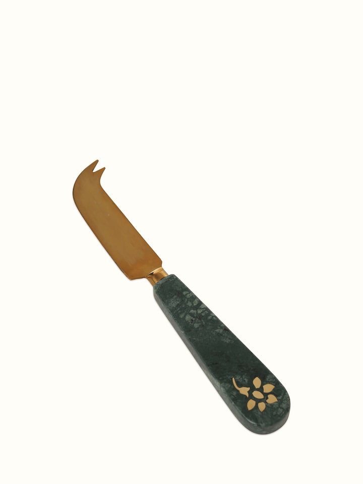 Angled view of Marble & Brass Cheese Knives (3 pcs) demonstrating their premium look
