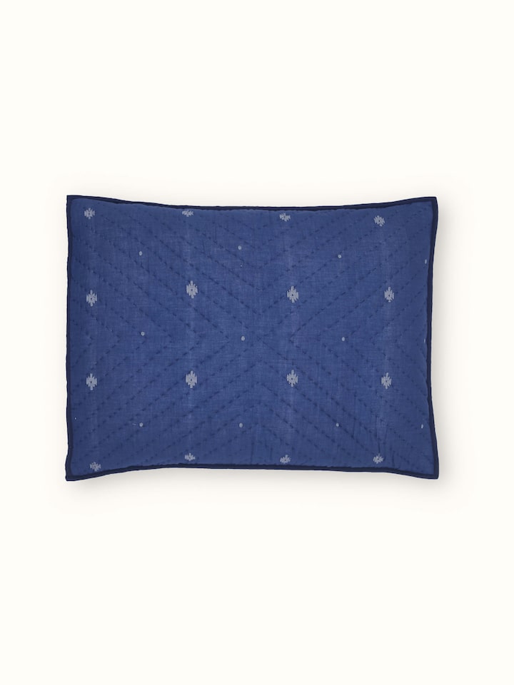 Detailed view of Kalpanama indigo woven buti cotton pillow shams showcasing the texture and elegant pattern.