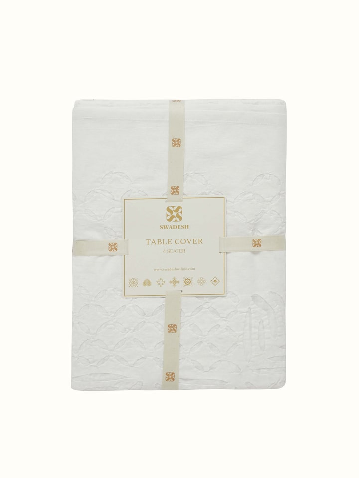 Ekam white trellis cotton appliqué embroidered table cover (4 seater) in a setting showing its use and design.