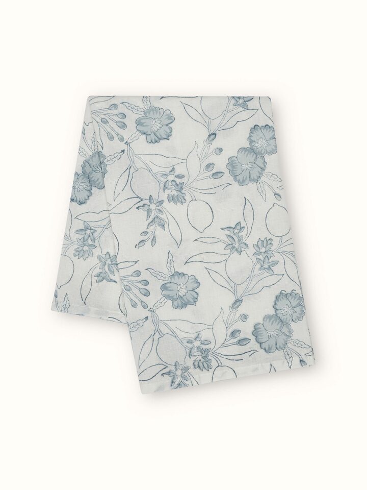 Detail view of Anika Light Blue Floral Cotton Linen Sanganeri Hand Block Printed Dinner Napkin stack showing the floral print