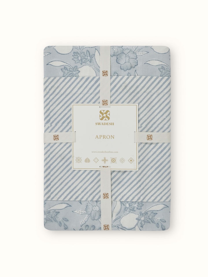 Full view of Anika light blue floral cotton Sanganeri block printed apron displaying the apron’s design and color pattern.