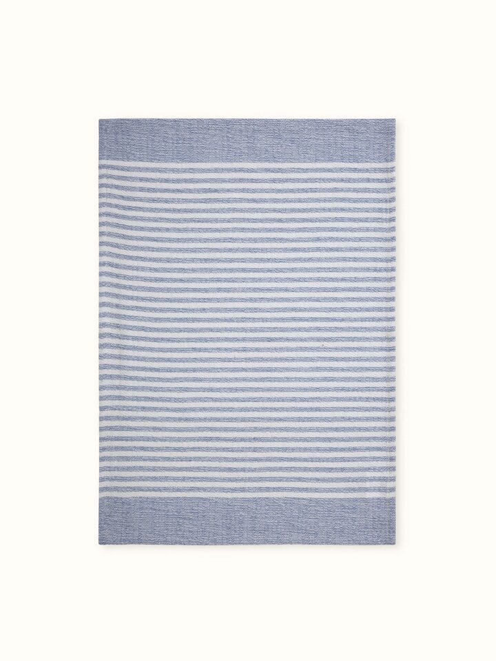Detailed view of Vayana stripe blue cotton hand towels, focusing on the texture and stripe pattern.