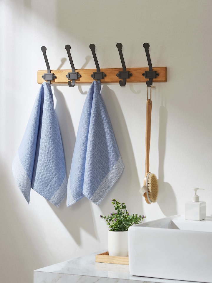Close-up view of Vayana solid blue stripe cotton hand towels (2 pcs) highlighting the fabric quality and stripe pattern.