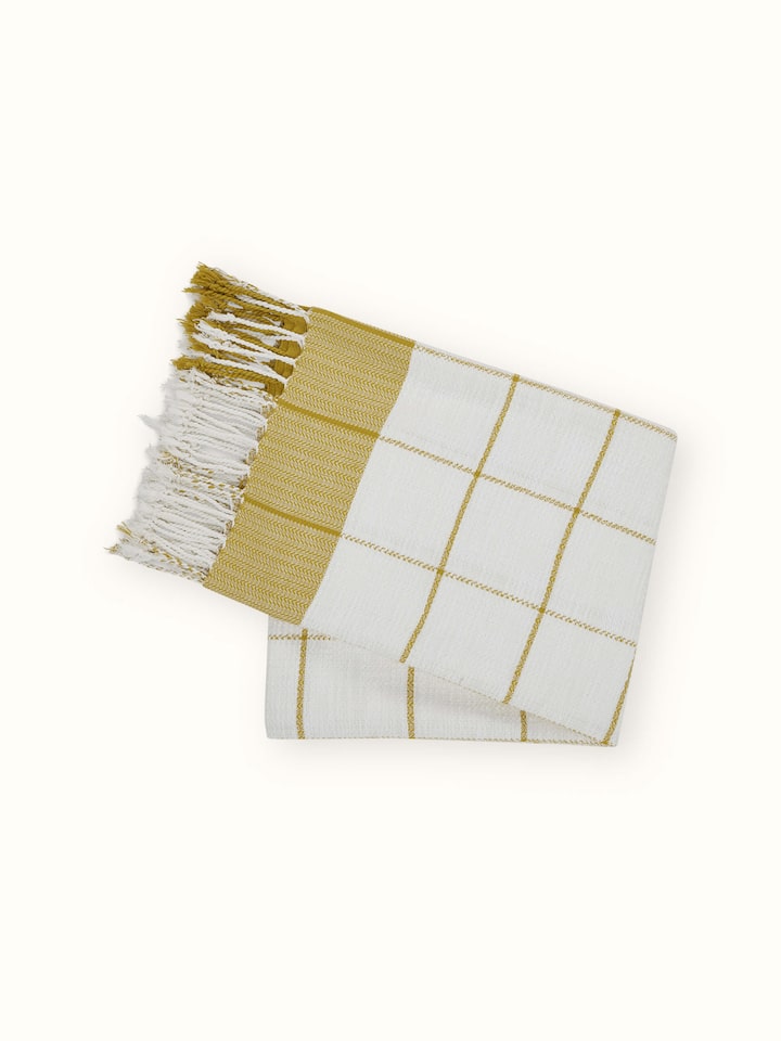Back view of Adhima Ochre Throw, displaying clean edges and fine finish of the handwoven cotton.
