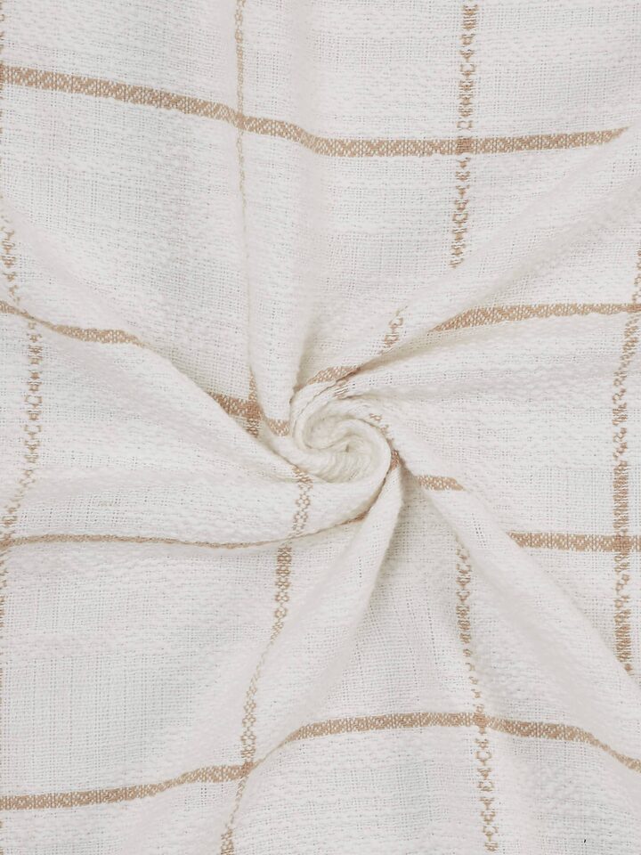 Folded view displaying the throw's thickness and weave precision.