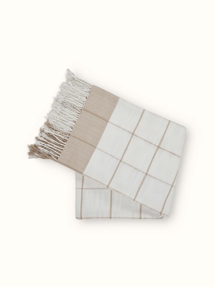 Back view of the throw highlighting handloom finishing and border edges.
