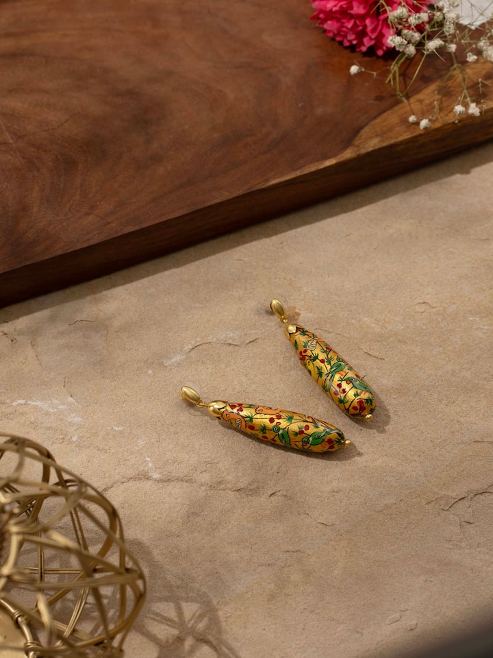Back view of Papier-mâché Drop Earrings showing hook and design details.