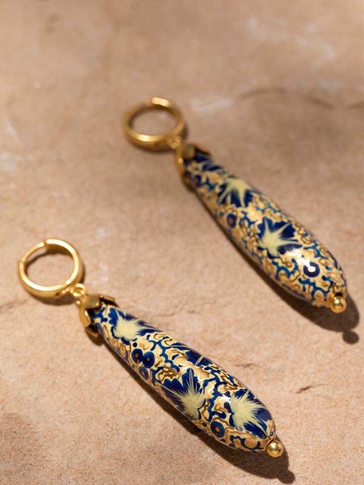 Detailed view of Papier-Mâché Drop Earrings focusing on craftsmanship and unique texture.