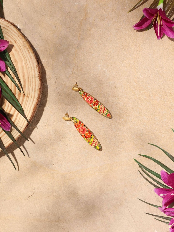 Close-up view of Papier-mâché Drop Earrings emphasizing the intricate design and colorful details.