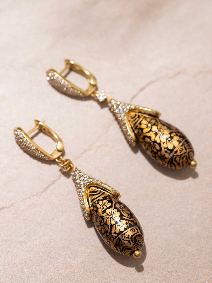 Angled view of Papier-mâché Drop Earrings emphasizing the unique design and vibrant colors.