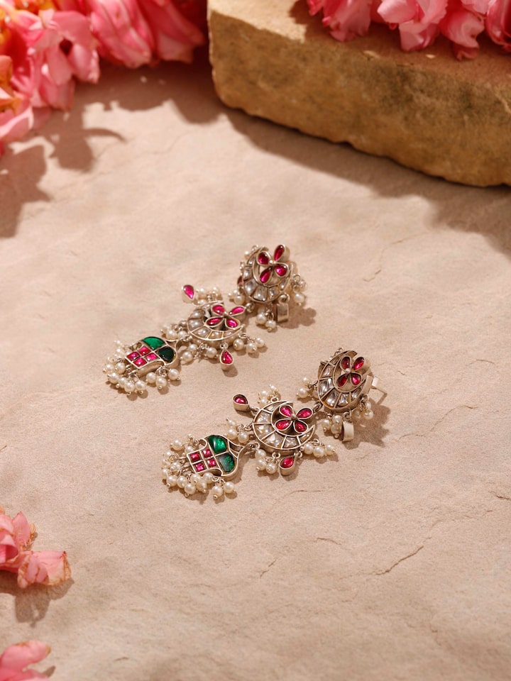 Angled view of Silver Smithing Drop Earrings emphasizing the design and silver finish.