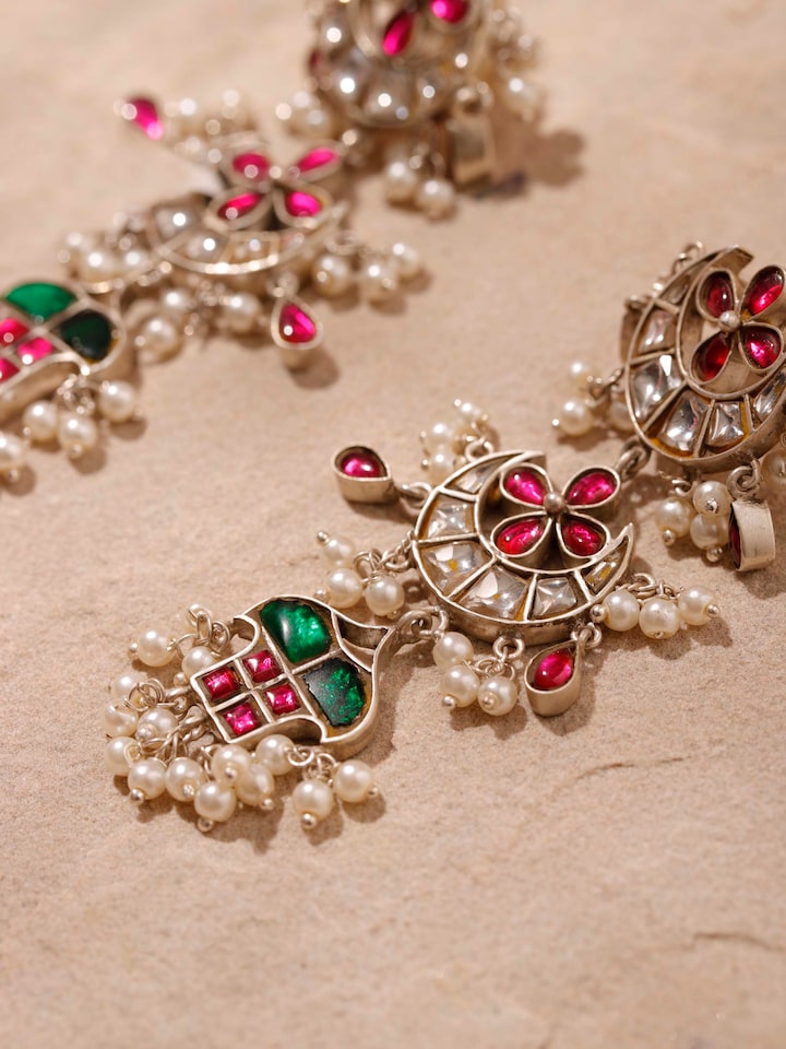 Detailed view of Silver Smithing Drop Earrings focusing on intricate silverwork and design.