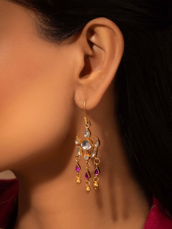 Side view of Silver Smithing Drop Earrings showcasing the refined silver work and elegant design.