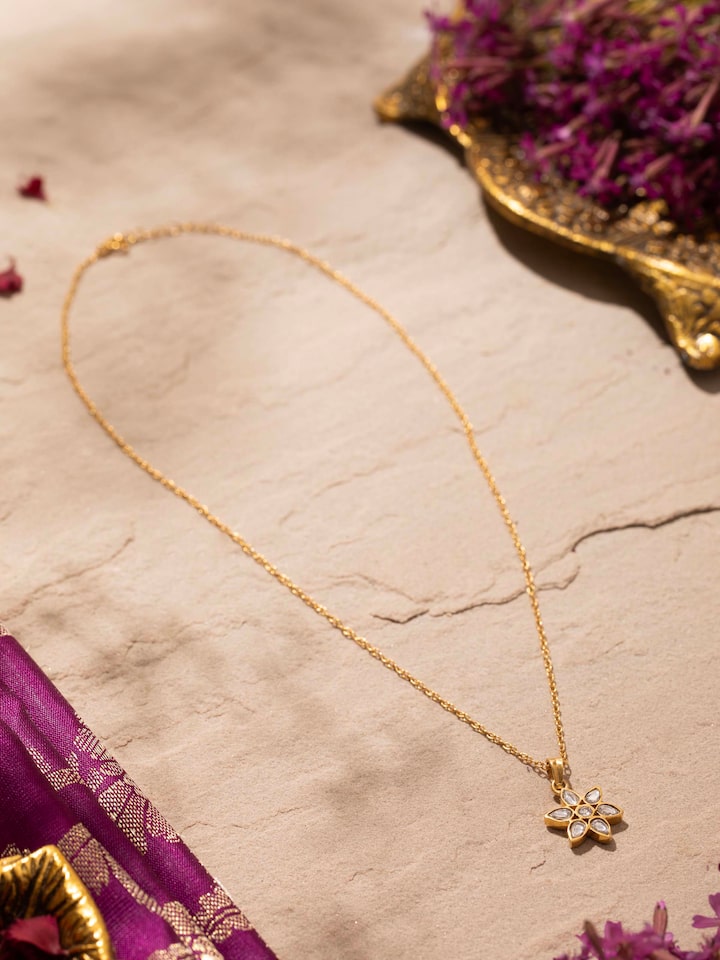 Side view of Silver Smithing Pendant & Chain showcasing the pendant's intricate detail and the chain's length