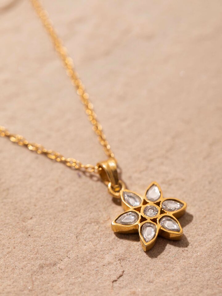 Angled view of Silver Smithing Pendant & Chain displaying the pendant's elegance and the chain's sleek design