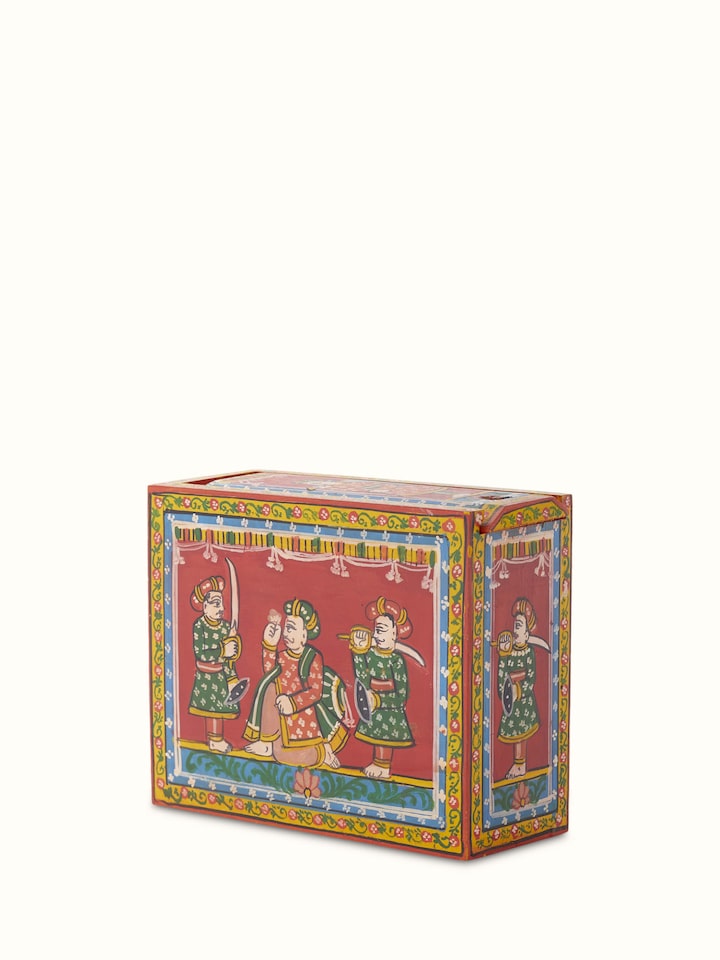 Top view of Ganjifa paper cards in red color (54 pcs) highlighting card arrangement