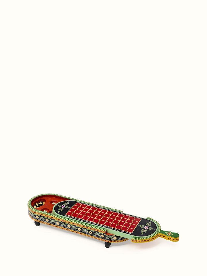 Detailed view of Ganjifa cedar wood 6-in-1 board game in red with visible game pieces