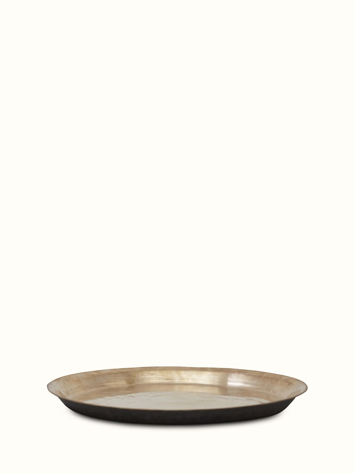 Front view of bell metal Balisiri dinner plate featuring intricate design and polished finish