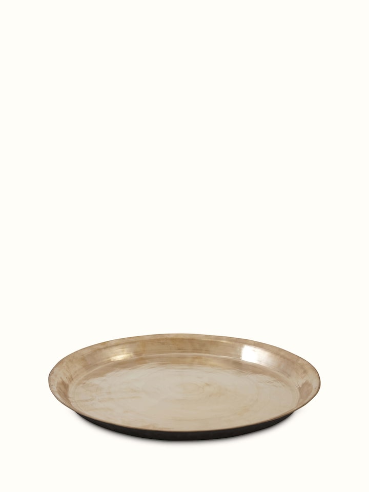 Side view of bell metal Balisiri dinner plate emphasizing the depth and curvature of the plate