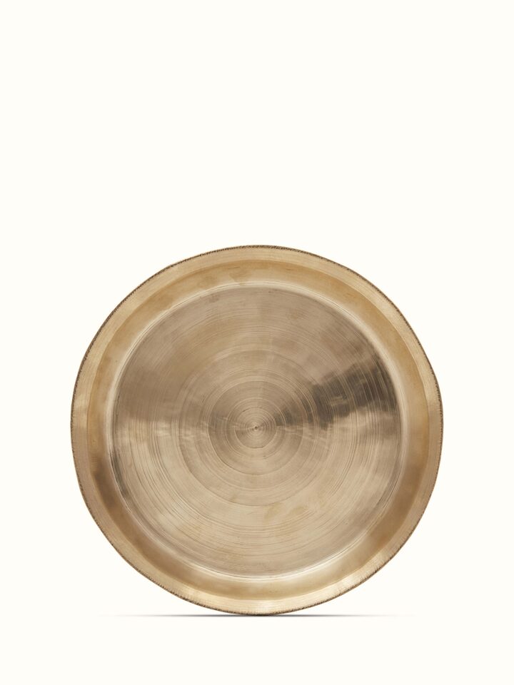 Front view of bell metal Balisiri side plate, featuring a polished metal finish and traditional design