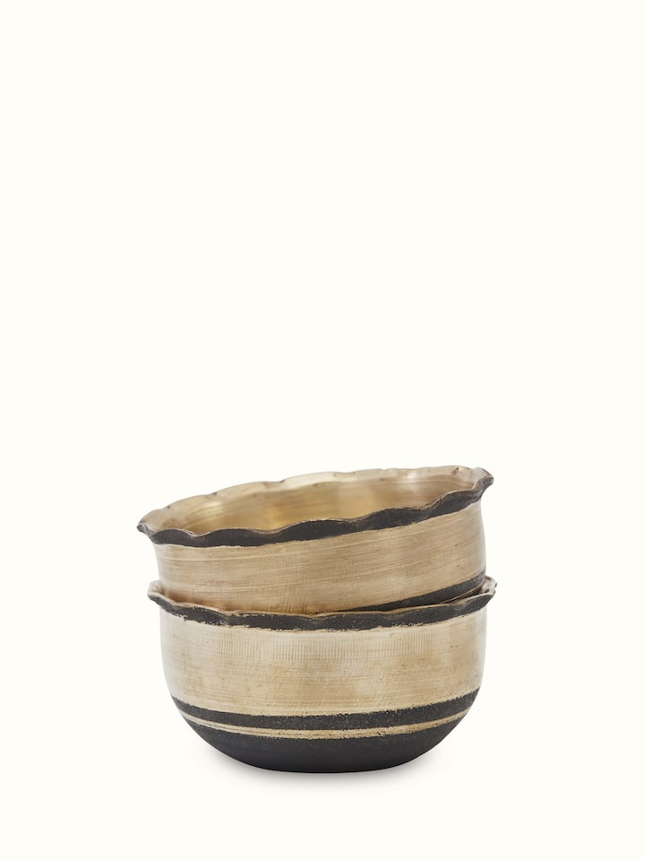 Detailed view of Bell metal pinchha dinner bowl highlighting craftsmanship