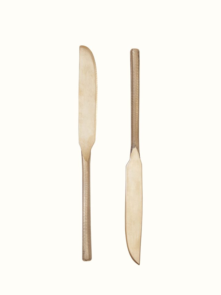 Detailed view of bell metal dinner knife highlighting fine craftsmanship