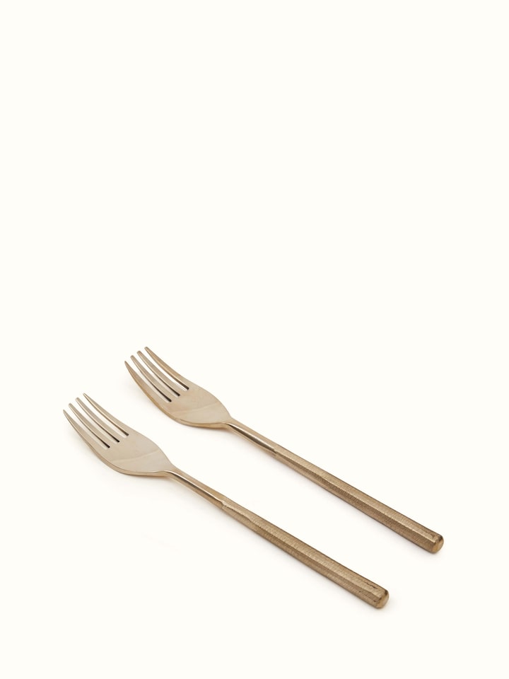 Side view of Bell Metal Dinner Fork showcasing the shape and detailing
