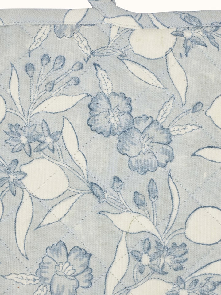 Full view of Anika light blue floral cotton Sanganeri block printed pot holder displaying the overall design and color.