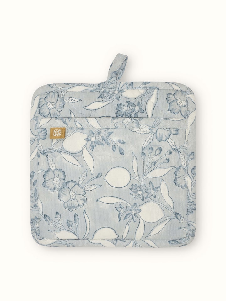 Anika light blue floral cotton Sanganeri block printed pot holder folded to show the floral print and fabric quality.