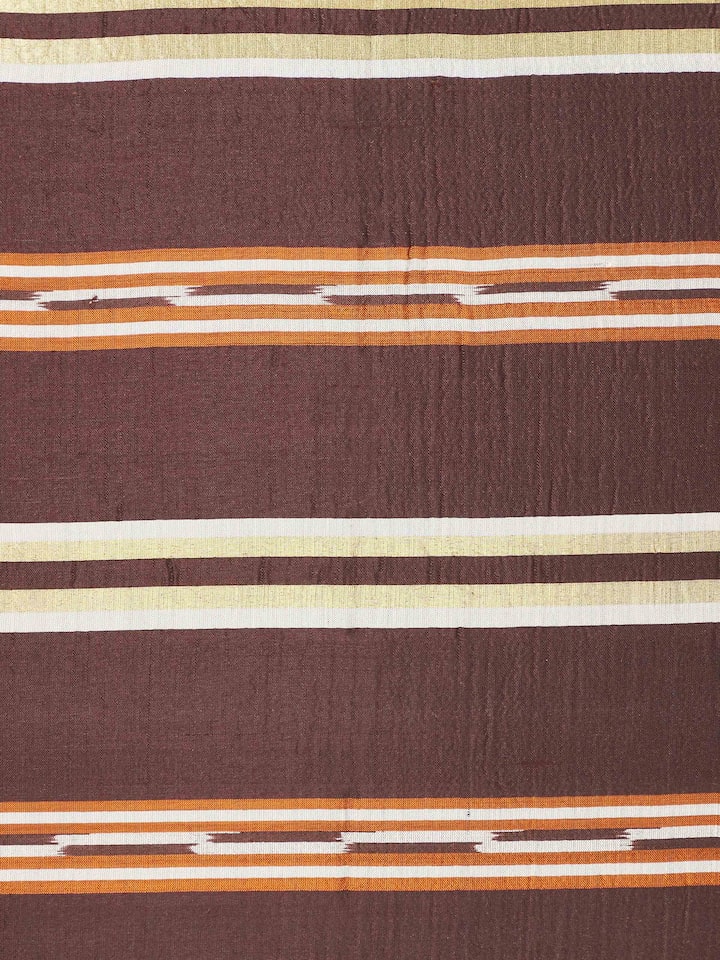 Close-up of Sanchaya Coffee Stripe Silk Odisha Handloom Ikat Cushion Cover focusing on the silk fabric and ikat weave.
