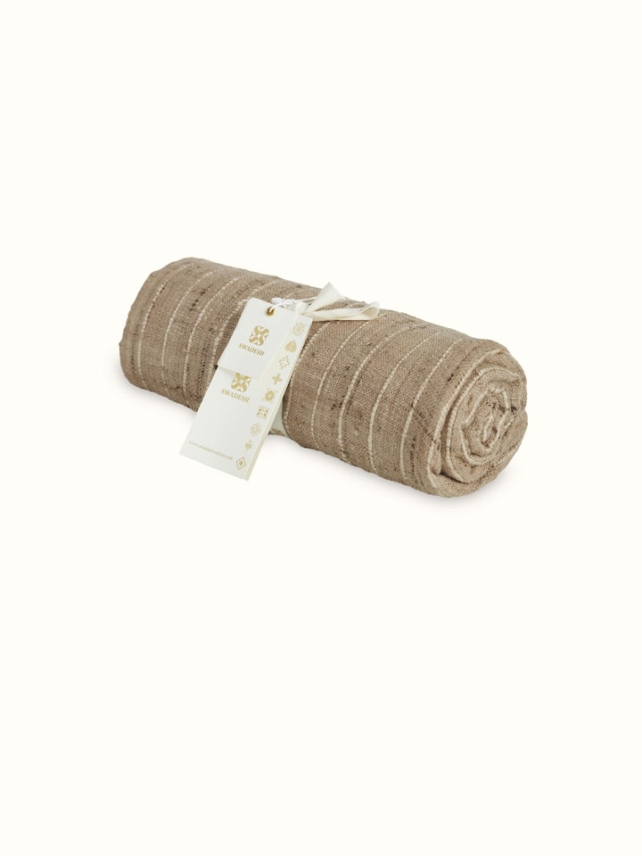 Close-up of Ujjal light brown sagar silk Bhagalpur handloom throw illustrating rich color and fabric texture