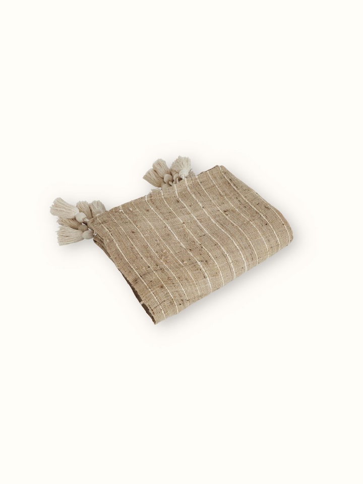 Side view of Ujjal light brown sagar silk Bhagalpur handloom throw displaying texture and drape