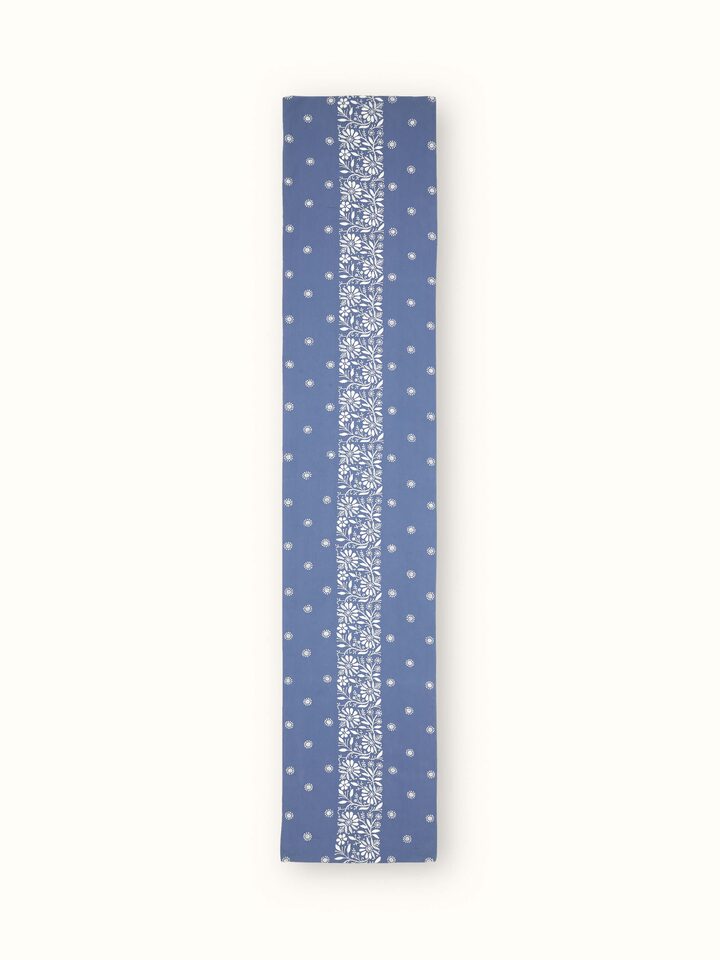 Front view of Rann blue border linen bed runner with white Chikankari hand embroidery.